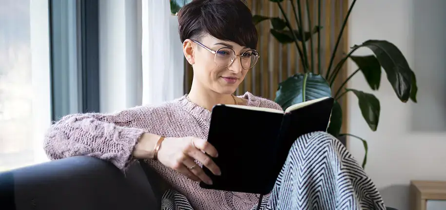 Rehab client reading a journal during medical detox
